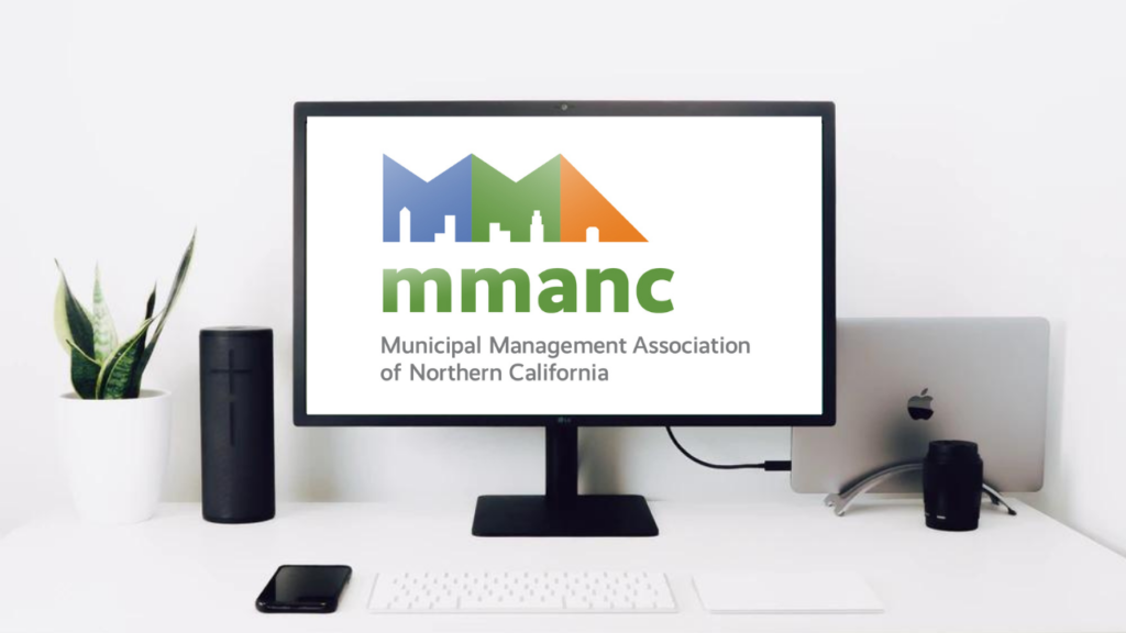 MMANC Virtual Zoom Background - Computer Desk with Logo on Screen